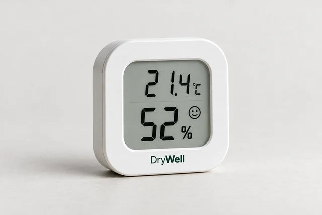 Digital humidity monitor showing room humidity and temperature